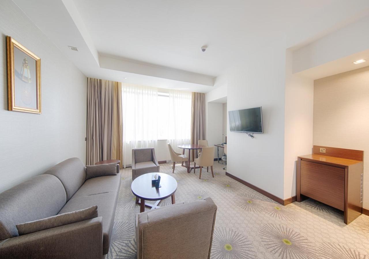 Holiday Suites Al Azizia Μέκκα Εξωτερικό φωτογραφία A room at the hotel
