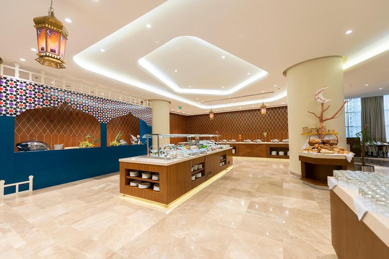 Holiday Suites Al Azizia Μέκκα Εξωτερικό φωτογραφία The hotel's restaurant