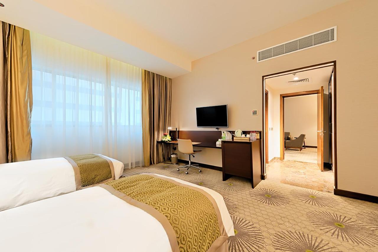 Holiday Suites Al Azizia Μέκκα Εξωτερικό φωτογραφία A room at the hotel